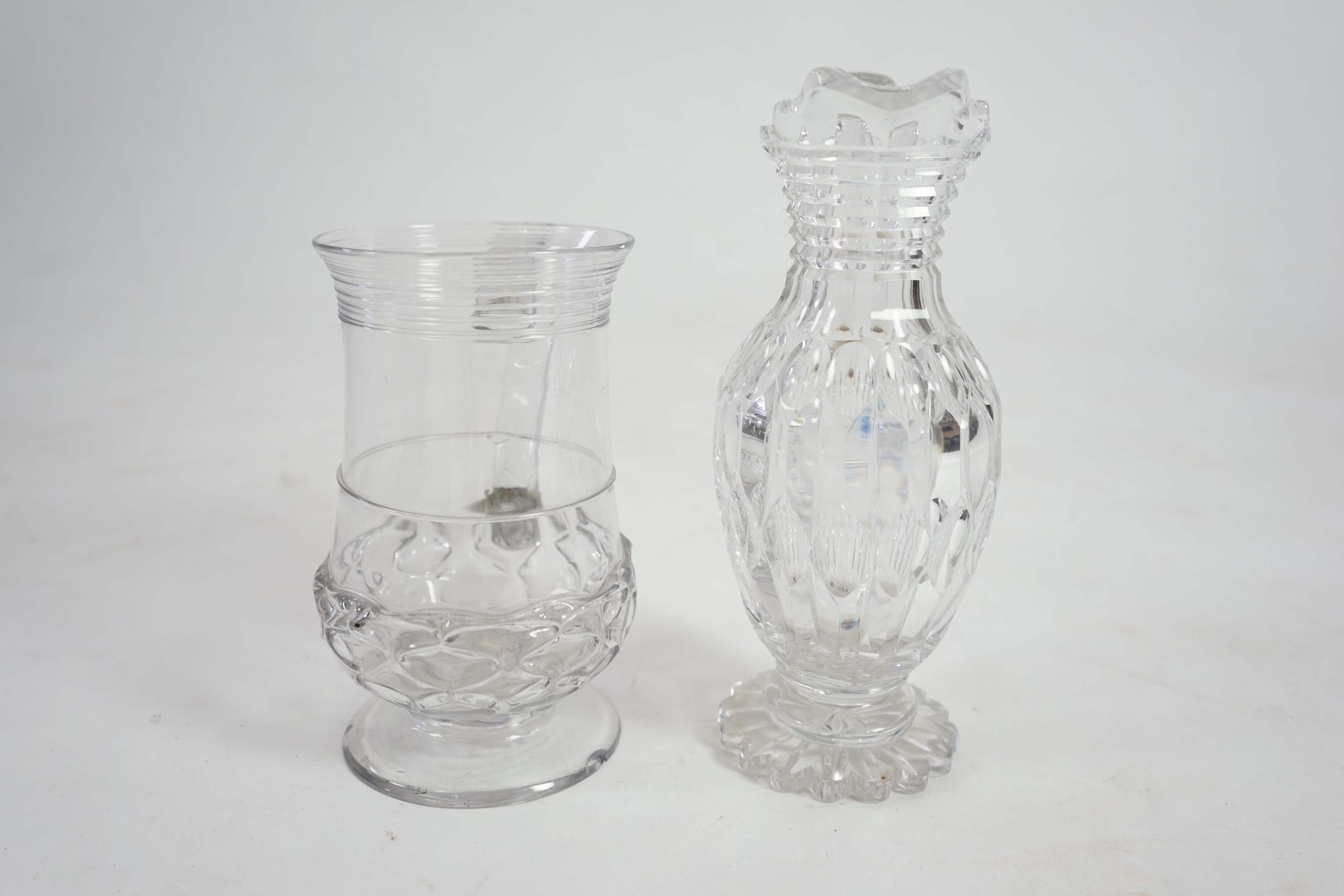 An 18th century wrythen moulded glass ale jug